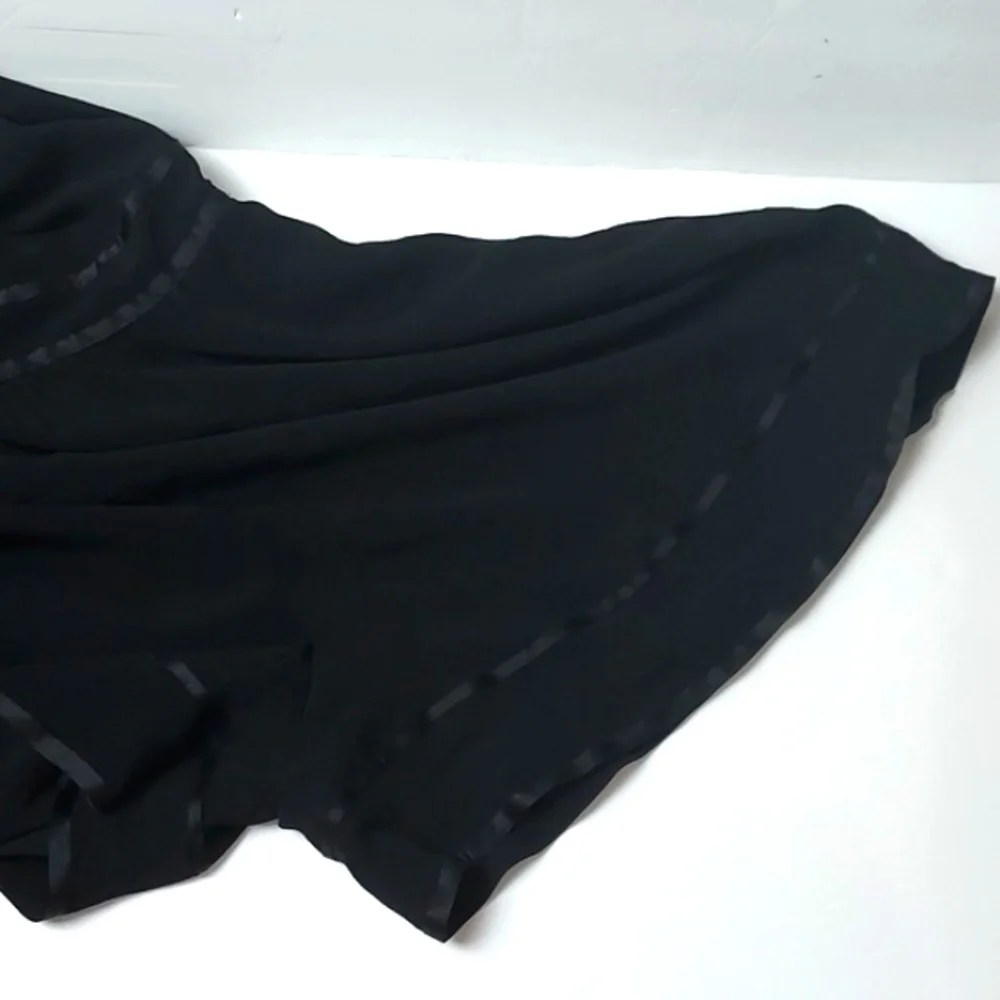 Anthropologie Romper Ruffled Black Size 6